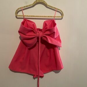 Boutique Romper with Bow on Front. Can tie the‎ straps however you would like S
